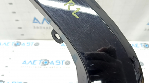 Rear left fender arch trim for Toyota Rav4 19-25, gloss black, on the body, scratches