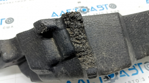 The upper front bumper absorber of a Toyota Rav4 19-24 is broken and missing fragments.