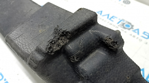 The upper front bumper absorber of a Toyota Rav4 19-24 is broken and missing fragments.