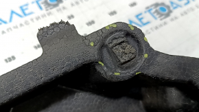 The upper front bumper absorber of a Toyota Rav4 19-24 is broken and missing fragments.
