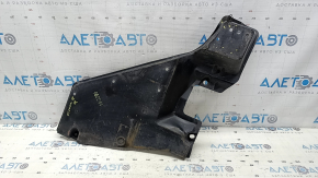 The rear right underbody protection of the Lexus ES300h 19-26 is worn, dented, and has tears