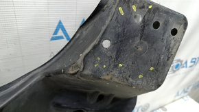 The rear right underbody protection of the Lexus ES300h 19-26 is worn, dented, and has tears