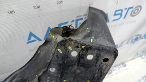 The rear right underbody protection of the Lexus ES300h 19-26 is worn, dented, and has tears