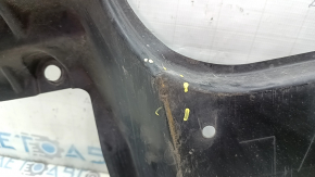 The rear left underbody protection of Lexus ES300h 19-26 is worn and dented