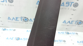 The front panel center trim for Lexus ES 19-22 is brown and worn