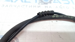 The boot on the rear hood release cable of a BMW X2 F39 18-23 has been torn off