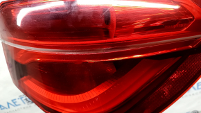 BMW X1 F48 16-19 LED outer right fender light, scratches, cracks under the glass