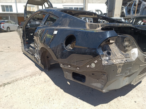 Quarter wing rear left Ford Mustang mk6 15-23 coupe, on the body, black. dented, torn