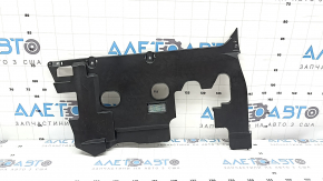 The lower front panel trim for the driver's footwell of the VW Atlas 20-23 is black, with backlighting, and is worn