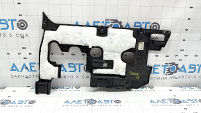 The lower front panel trim for the driver's footwell of the VW Atlas 20-23 is black, with backlighting, and is worn