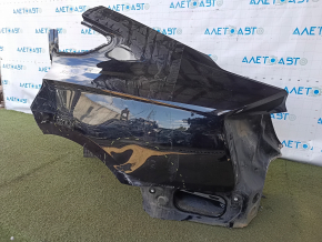 The quarter wing of the rear left Audi A5 F5 18-25 5D is sawn off, without a roll, black, dented