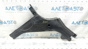 The rear left underbody protection of BMW 5 F10 11-16 is dented and worn