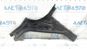 The rear left underbody protection of BMW 5 F10 11-16 is dented and worn