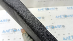 The lower right center pillar trim for BMW 5 F10 11-16 is black and the coating has peeled off