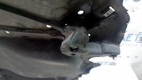 The right underbody protection of the VW Atlas 18-26 is dented and torn