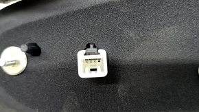 The inner light of the trunk door, left, Honda CRV 23-26, is worn