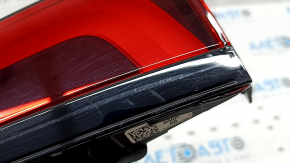 The inner light of the trunk door, left, Honda CRV 23-26, is worn