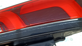 The inner light of the trunk door, left, Honda CRV 23-26, is worn