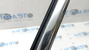 Molding door-glass central rear left BMW 5 G30 17-23 chrome, scratches
