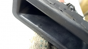 The button for opening the trunk lid of a BMW 5 G30 17-23 under the camera is worn out