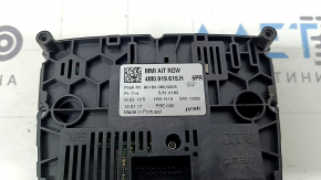 The MMI control panel of the Audi Q7 16-18 has a swollen coating, scratches, and a bump on the button