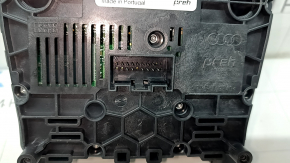 The MMI control panel of the Audi Q7 16-18 has a swollen coating, scratches, and a bump on the button