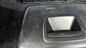 Left arch trim BMW 5 G30 17-23 black, under the first aid kit, scratches on the trim, broken mesh mount