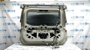 The trunk door is bare with glass for Nissan Rogue 18-20, electric drive, white QAB, with a brake light, with an overlay and license plate light