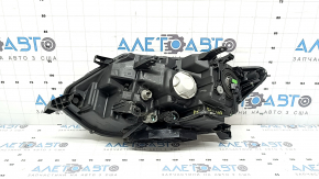 Front right headlight Nissan Rogue 17-20 halogen, sand, crack in the housing