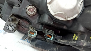 Front right headlight Nissan Rogue 17-20 halogen, sand, crack in the housing