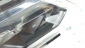 Front right headlight Nissan Rogue 17-20 halogen, sand, crack in the housing
