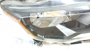 Front right headlight Nissan Rogue 17-20 halogen, sand, crack in the housing
