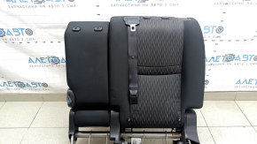 The back of the rear row of seats, 2nd row, left, Nissan Rogue 17-20, black fabric, with a belt, armrest and lower frame, is wrinkled