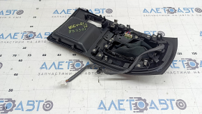 Nissan Rogue 19-20 black gearshift cover, under the parking button, worn