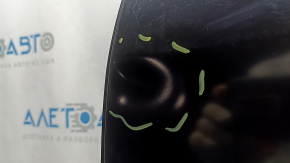 The bare rear left door of a Toyota Prius 50 16-20 is dented