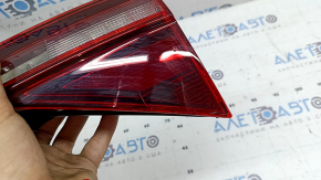 The inner light of the trunk lid, right VW Jetta 19-24, cracked glass