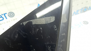 Triangle plug for the rear wing left Nissan Ariya 23-26 with black molding, in glue