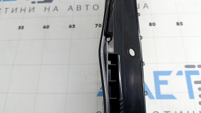 Triangle plug for the right rear wing of a Nissan Ariya 23-26 with black molding, bent, scratches