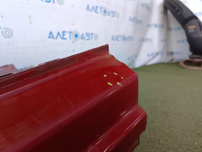 The front left quarter of the VW Tiguan 18-24 is sawed off, red, there is a bump on the threshold