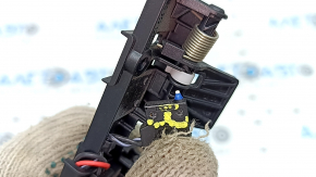 The Audi Q5 80A 18-25 trunk light switch has a broken mount