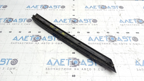 Left side trunk door trim for Audi Q3 8U 15-18 along glass, gloss black, broken mount