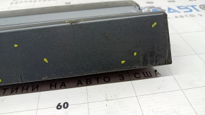 The lower front left door trim of the Audi Q3 8U 16-18 is worn and dented