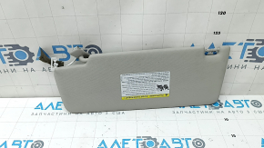 Right sun visor VW Tiguan 18-24 gray, without hook, crack in fastening, dents