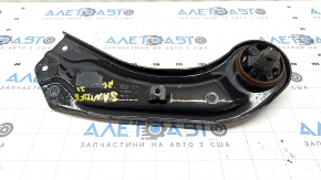 The rear left longitudinal arm of Hyundai Santa FE 21-23 has a torn silent block