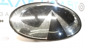 The grill emblem for the Infiniti QX50 19-25 with Distronic is worn and cracked