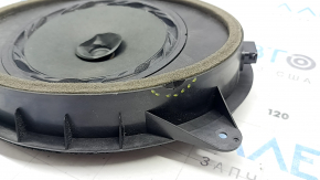 The front left door speaker of the Subaru Forester 14-18 SJ is dented, there is a chip on the housing