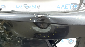The trunk door is bare BMW X3 G01 18-24 graphite A90M, dented