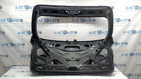 The trunk door is bare BMW X3 G01 18-24 graphite A90M, dented