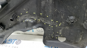 The rear right control arm lining under the spring of Mercedes W167 GLE 350 450 20-26 has tears
