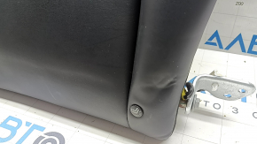 The back of the rear row of seats, left, Tesla Model 3 18-23, black leather, with a belt and heating, is wrinkled